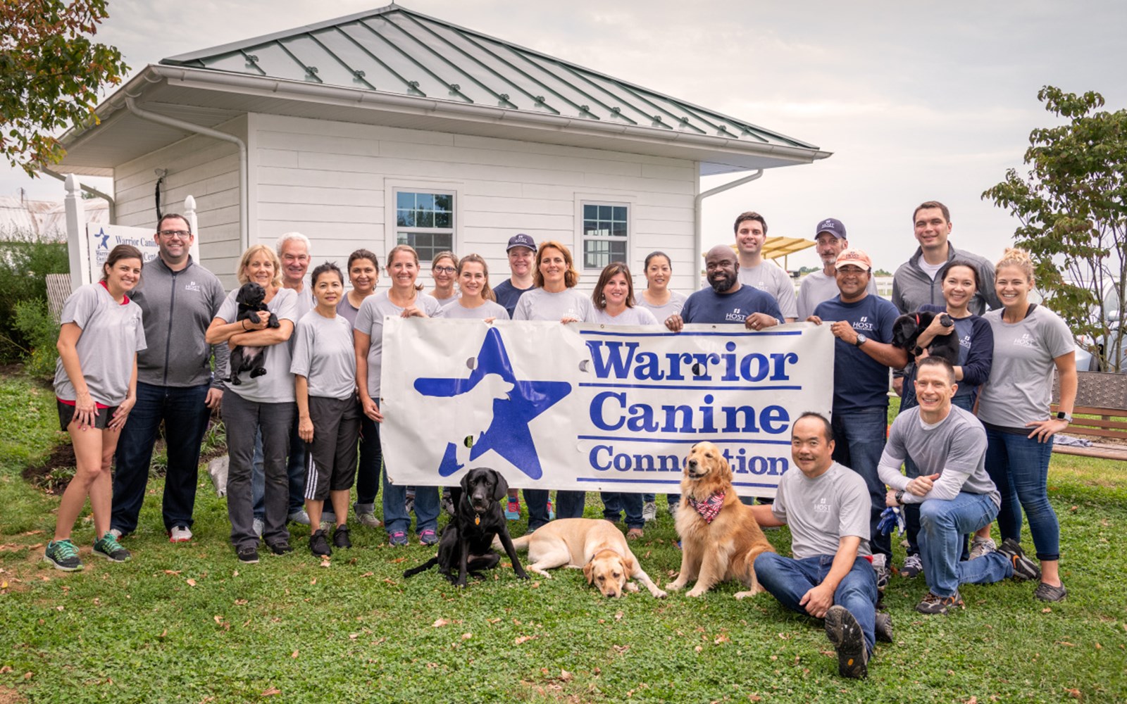 Volunteers painted, helped with some gardening, and played with puppies.