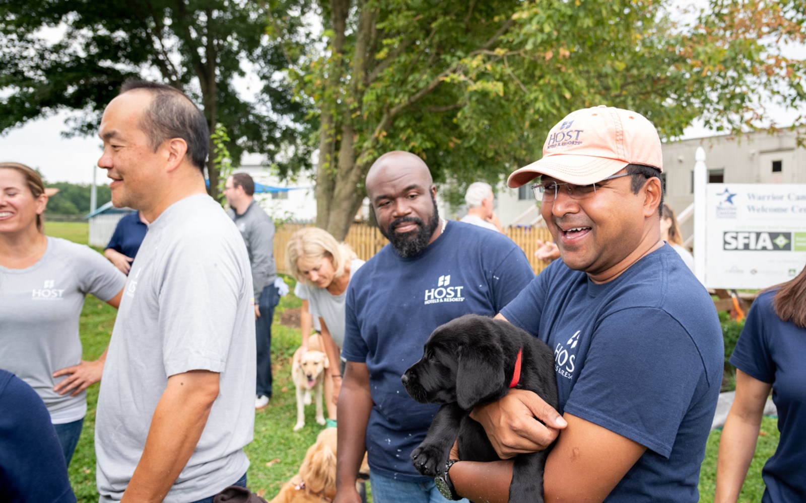 Volunteers painted, helped with some gardening, and played with puppies.
