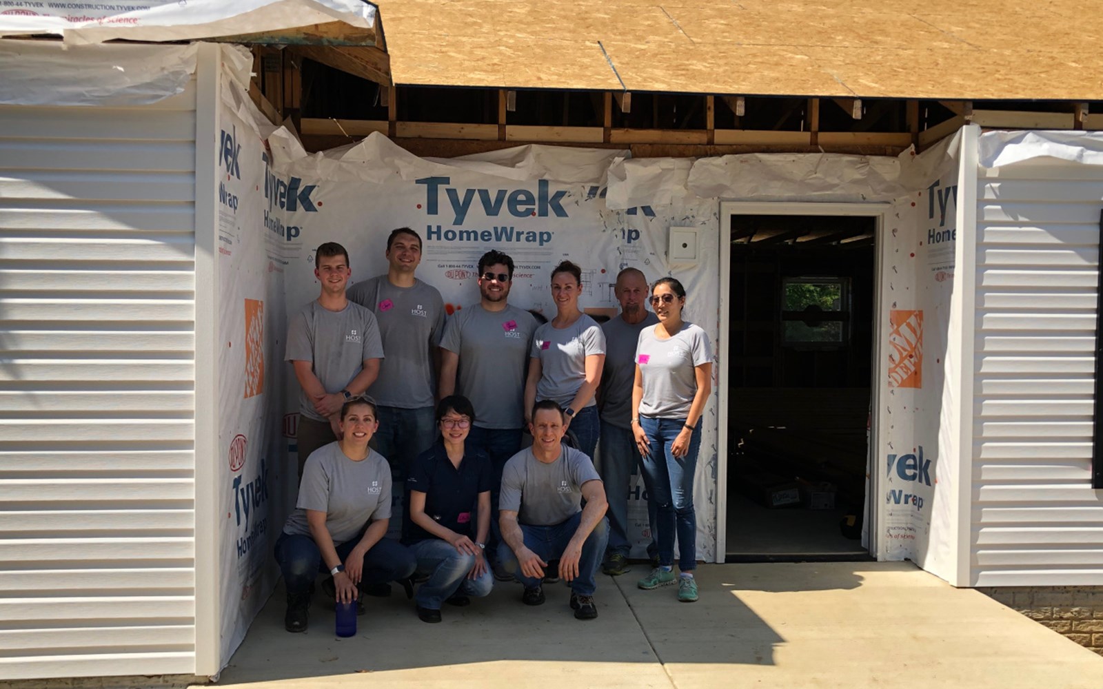 Host employees help at a house in Capitol Heights, MD