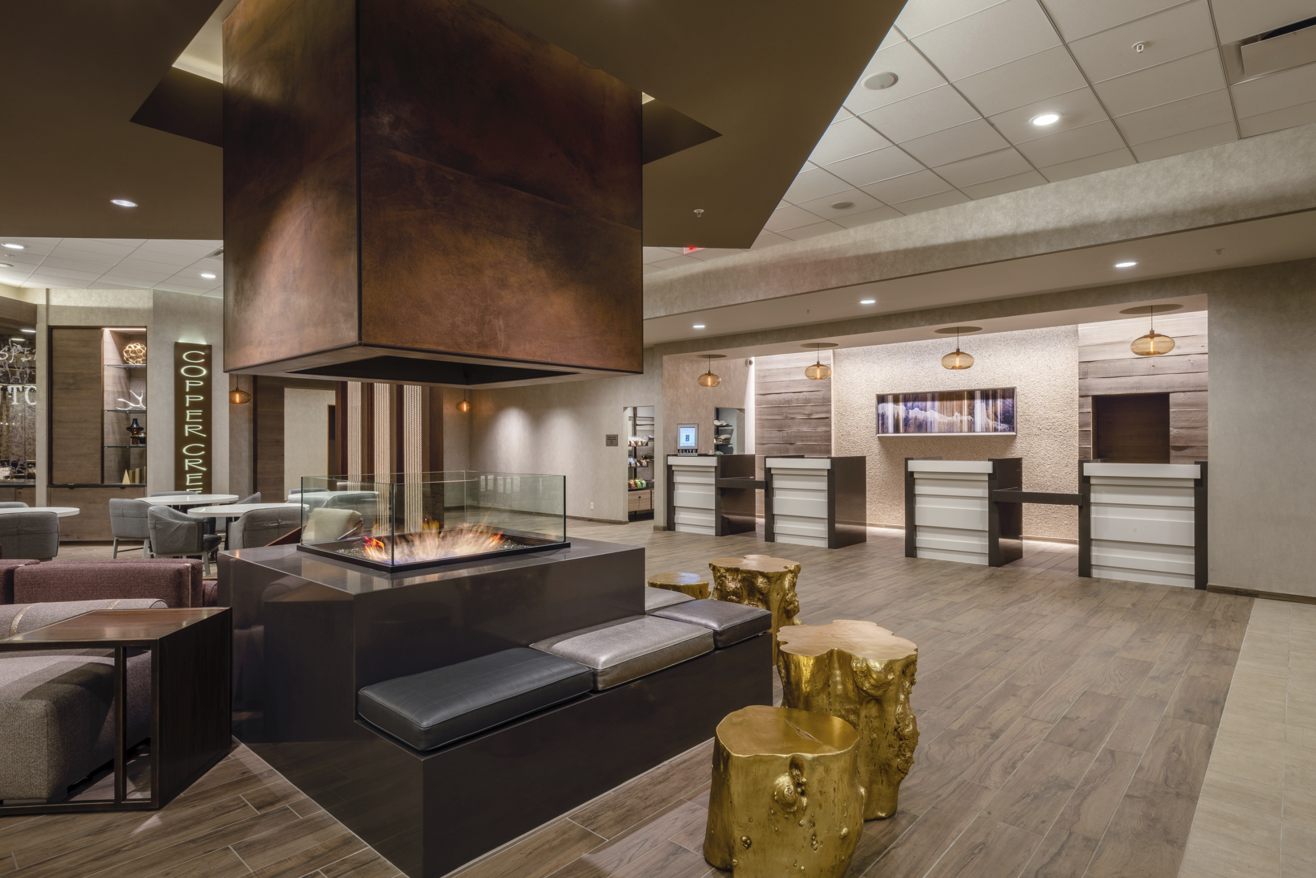 Lobby, fireplace, and front desk